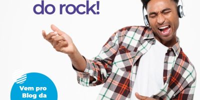 Jovem usando fones de ouvido e se divertindo enquanto estuda, representando músicas para aprender história para o Enem, unindo conteúdo educativo e clássicos do rock.